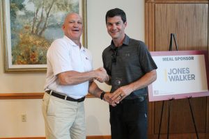 Dean of Engineering with a winner in a dark grey shirt